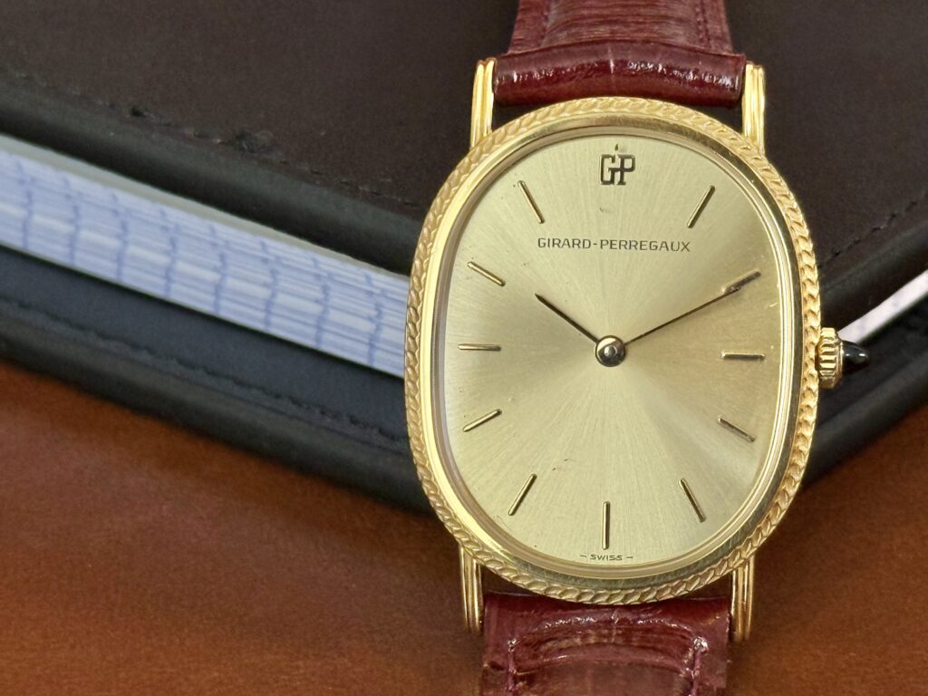 Girard-Perregaux with a Champagne Gold Dial and Black Onyx Crown img 6125